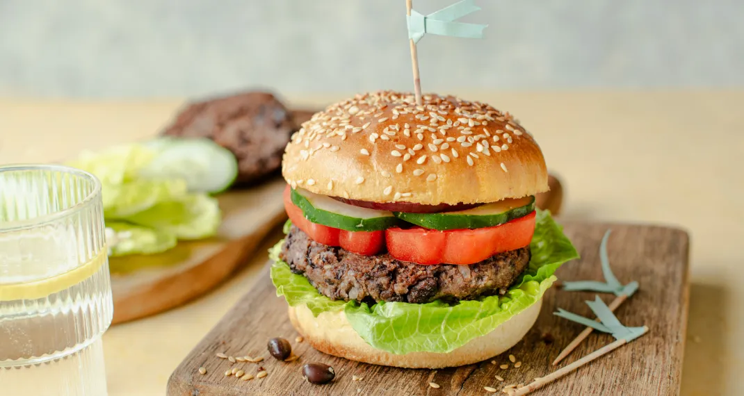 Burger from black beans with a whole wheat bun